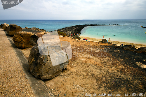 Image of harbor pier boat in the blue   arrecife teguise lanzarote 