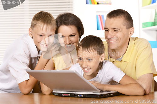 Image of Happy family of four 