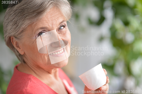 Image of happy retired woman 