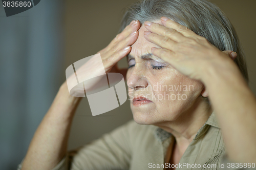 Image of Ill senior woman