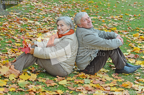 Image of Couple in autumn park s