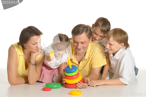 Image of Happy family playing 