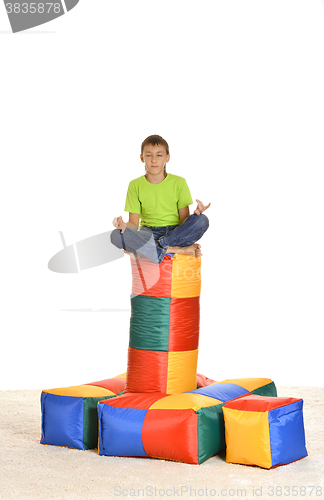 Image of  Caucasian teenager sitting 