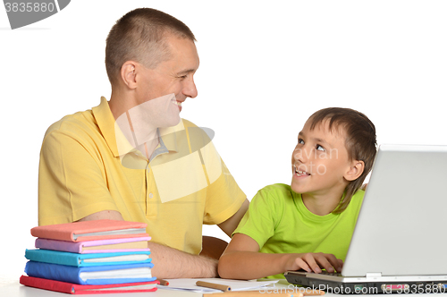 Image of Father is helping his son