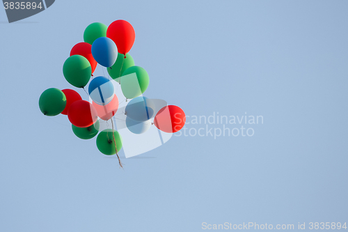 Image of Colorful balloons in blue sky