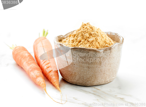 Image of bowl of dried carrot powder