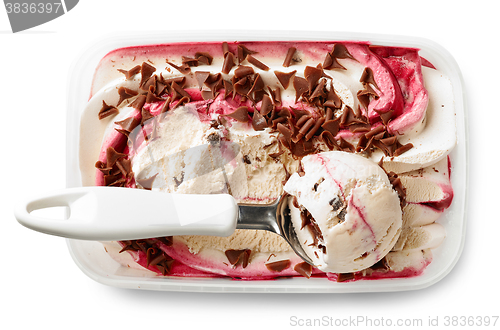 Image of Ice cream in plastic box and scoop