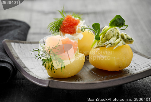 Image of decorated boiled potatoes on plate