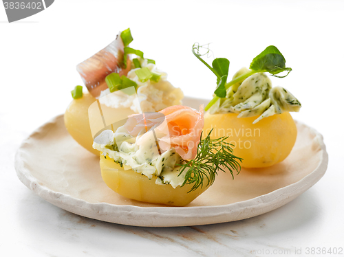 Image of decorated boiled potatoes on plate