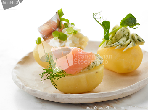 Image of decorated boiled potatoes on plate