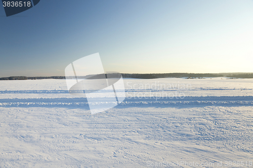 Image of the field covered with snow  