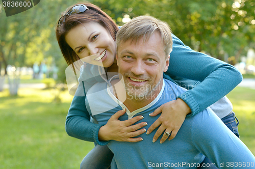 Image of couple  in summer field