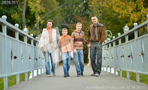 Image of Happy family of four 