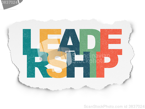 Image of Business concept: Leadership on Torn Paper background