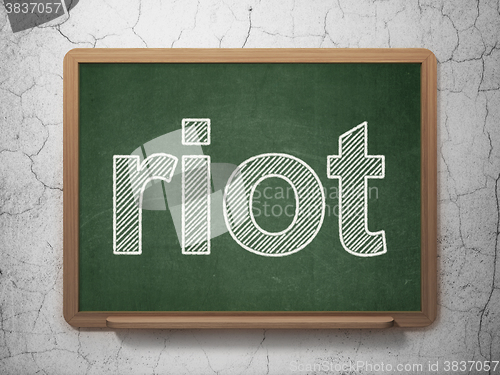 Image of Politics concept: Riot on chalkboard background