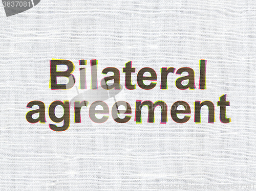 Image of Insurance concept: Bilateral Agreement on fabric texture background