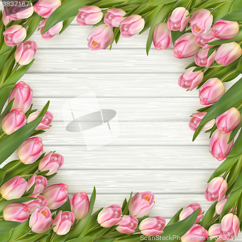 Image of Pink tulips on wooden background. EPS 10