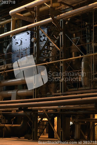 Image of different size and shaped pipes at a power plant