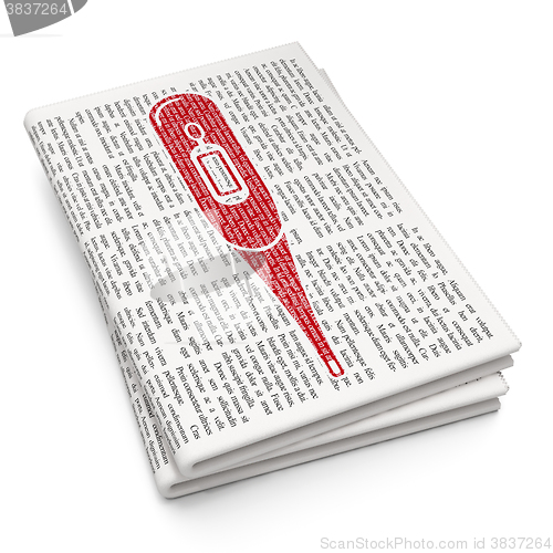 Image of Health concept: Thermometer on Newspaper background