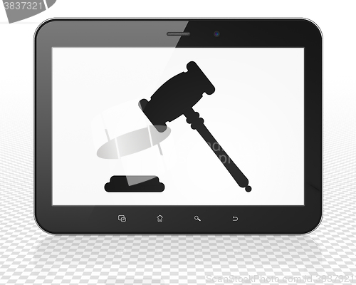 Image of Law concept: Tablet Pc Computer with Gavel on display