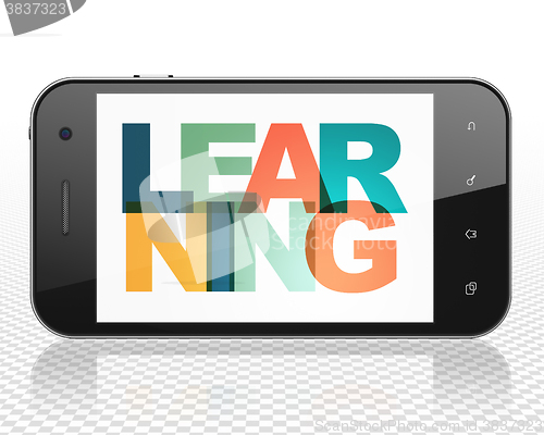 Image of Education concept: Smartphone with Learning on  display