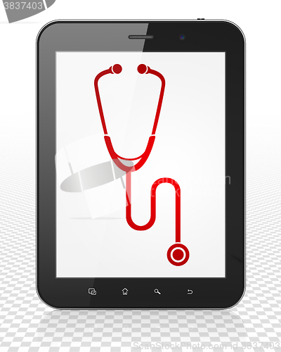 Image of Healthcare concept: Tablet Pc Computer with Stethoscope on display