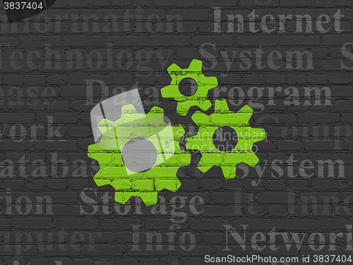 Image of Data concept: Gears on wall background