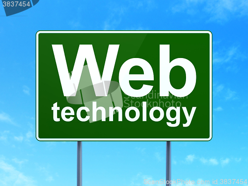 Image of Web development concept: Web Technology on road sign background