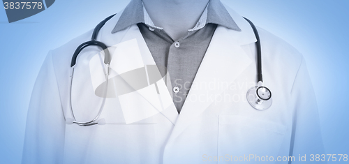 Image of Close up of male doctor with stethoscope, medical blue