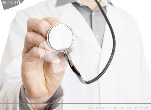 Image of Close up of a Doctor\'s hand, holding a stethoscope 