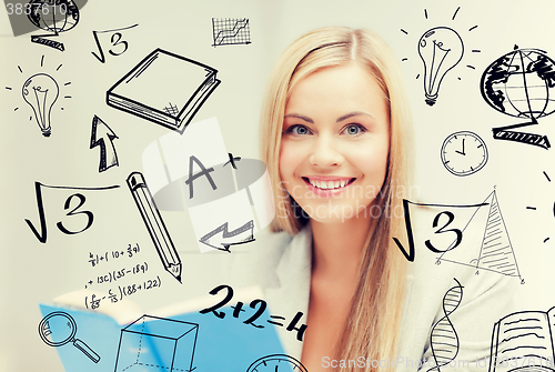 Image of student with doodles reading book