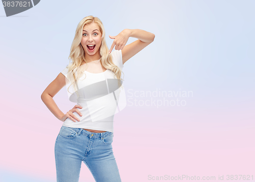 Image of happy young woman or teenage girl in white t-shirt