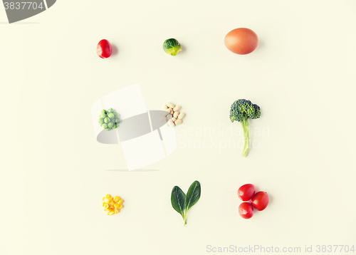 Image of close up of ripe vegetables and food over white