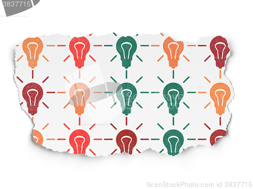 Image of Finance concept: Light Bulb icons on Torn Paper background
