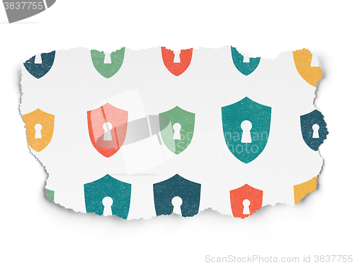 Image of Protection concept: Shield With Keyhole icons on Torn Paper background