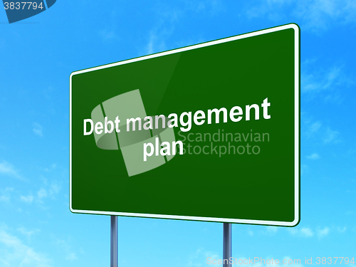 Image of Finance concept: Debt Management Plan on road sign background