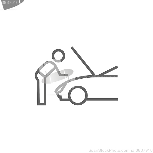 Image of Man fixing car line icon.