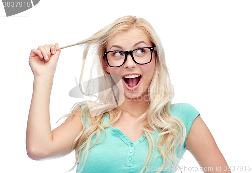 Image of happy young woman or teenage girl in glasses