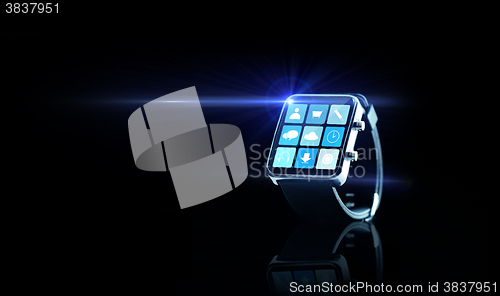 Image of close up of black smartwatch with app icons