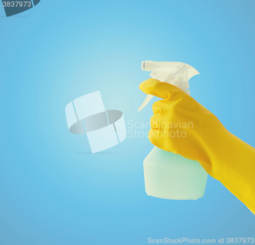 Image of close up of hand with cleanser spraying