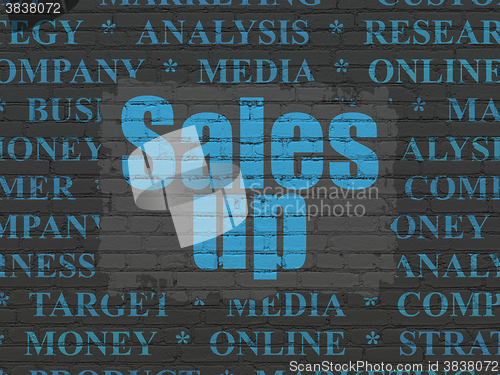 Image of Advertising concept: Sales Up on wall background