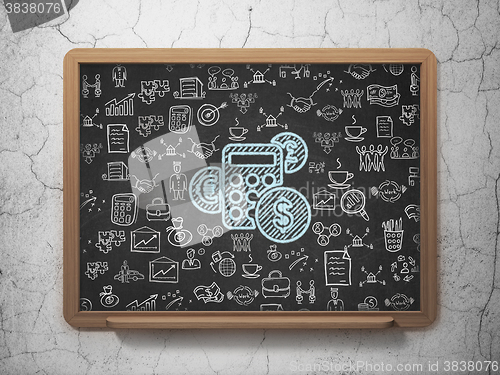 Image of Finance concept: Calculator on School Board background