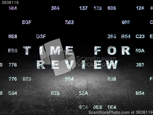 Image of Time concept: Time for Review in grunge dark room