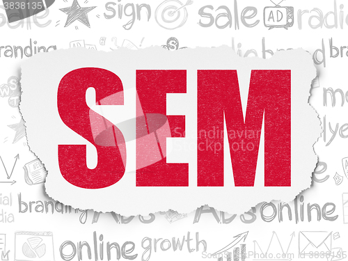 Image of Advertising concept: SEM on Torn Paper background