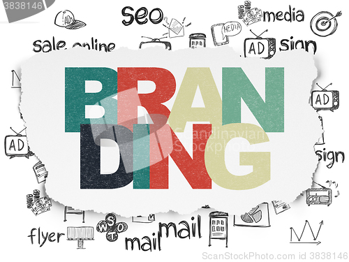 Image of Marketing concept: Branding on Torn Paper background