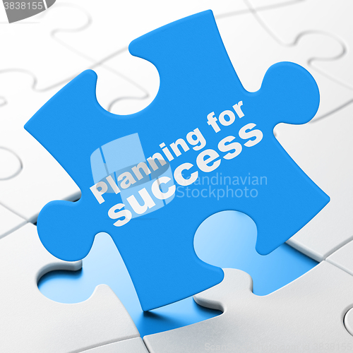 Image of Finance concept: Planning for Success on puzzle background