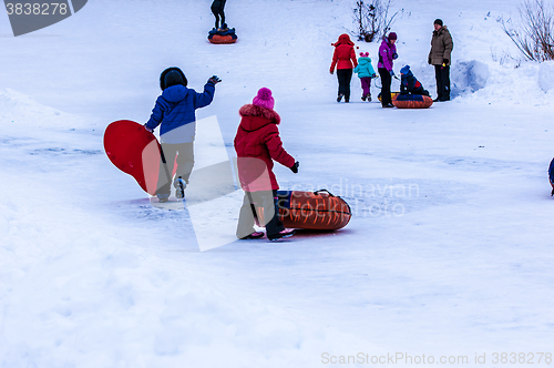 Image of Baby winter sledding on the Ural River