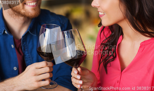 Image of happy couple dining and drink wine at restaurant