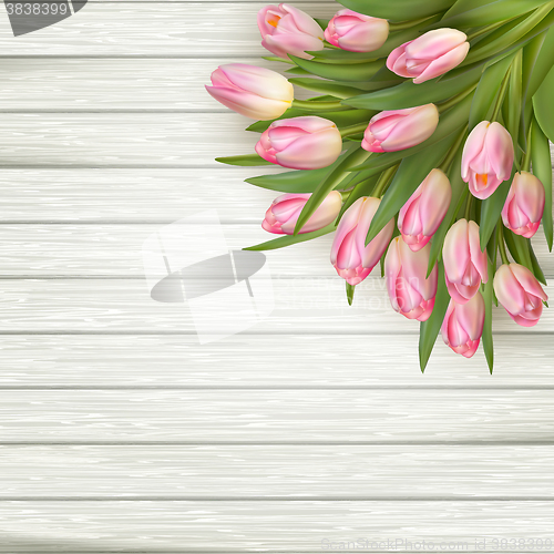 Image of Pink tulips over white wood table. EPS 10