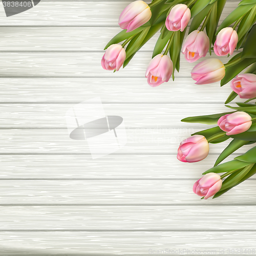 Image of Pink tulips over white wood table. EPS 10
